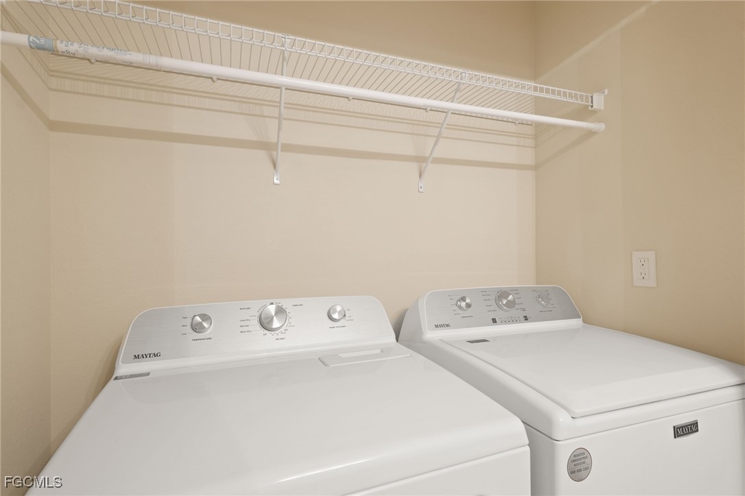 11040 Yellow Poplar Drive Fort Myers, FL 33913 - Photo 17 of 35 a utility room with dryer and washer