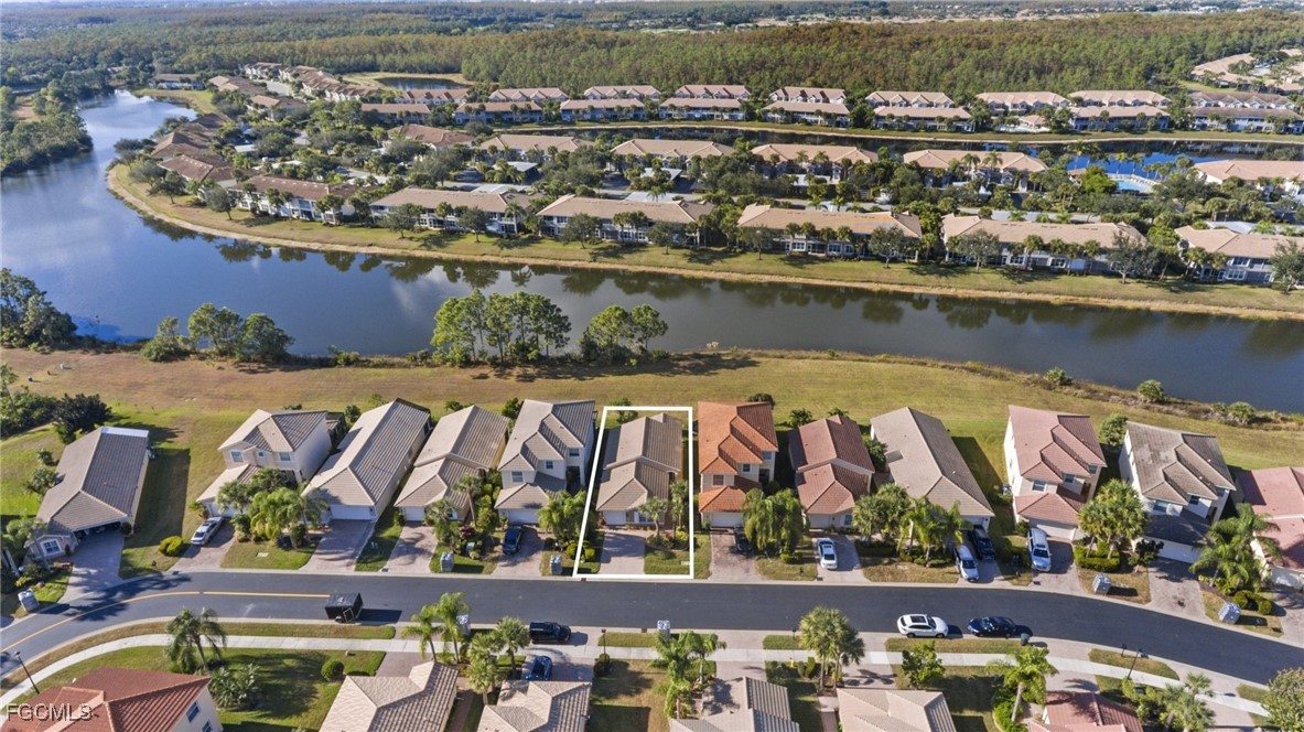 11040 Yellow Poplar Drive Fort Myers, FL 33913 - Photo 23 of 35 an aerial view of residential houses with outdoor space