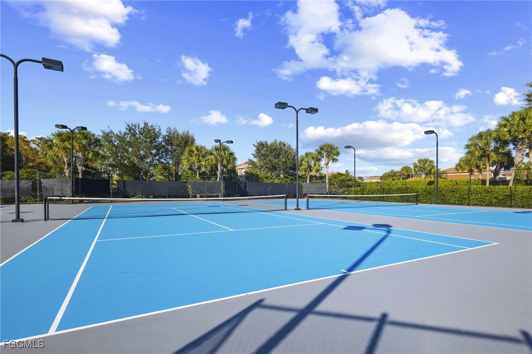 11040 Yellow Poplar Drive Fort Myers, FL 33913 - Photo 27 of 35 a view of a tennis court