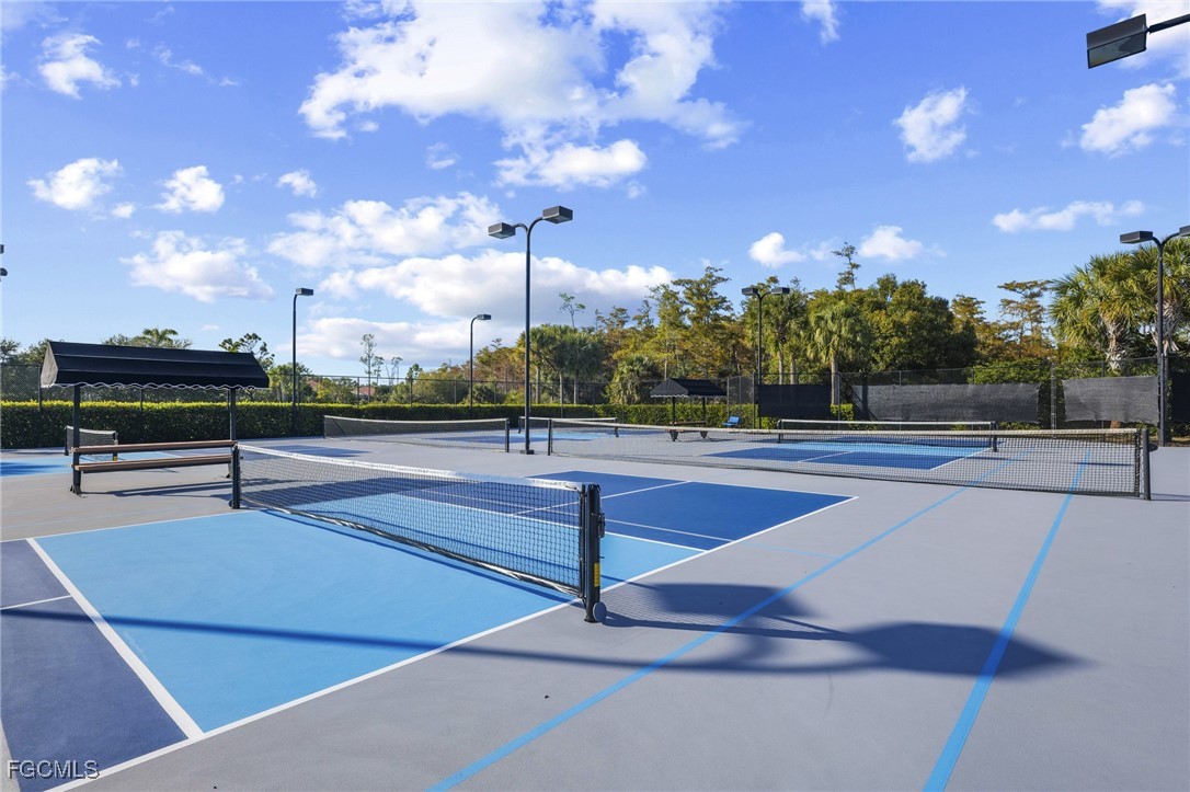 11040 Yellow Poplar Drive Fort Myers, FL 33913 - Photo 28 of 35 a view of a tennis court