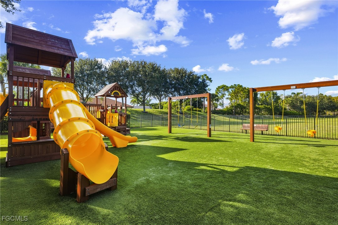 11040 Yellow Poplar Drive Fort Myers, FL 33913 - Photo 30 of 35 a view of a park with slide