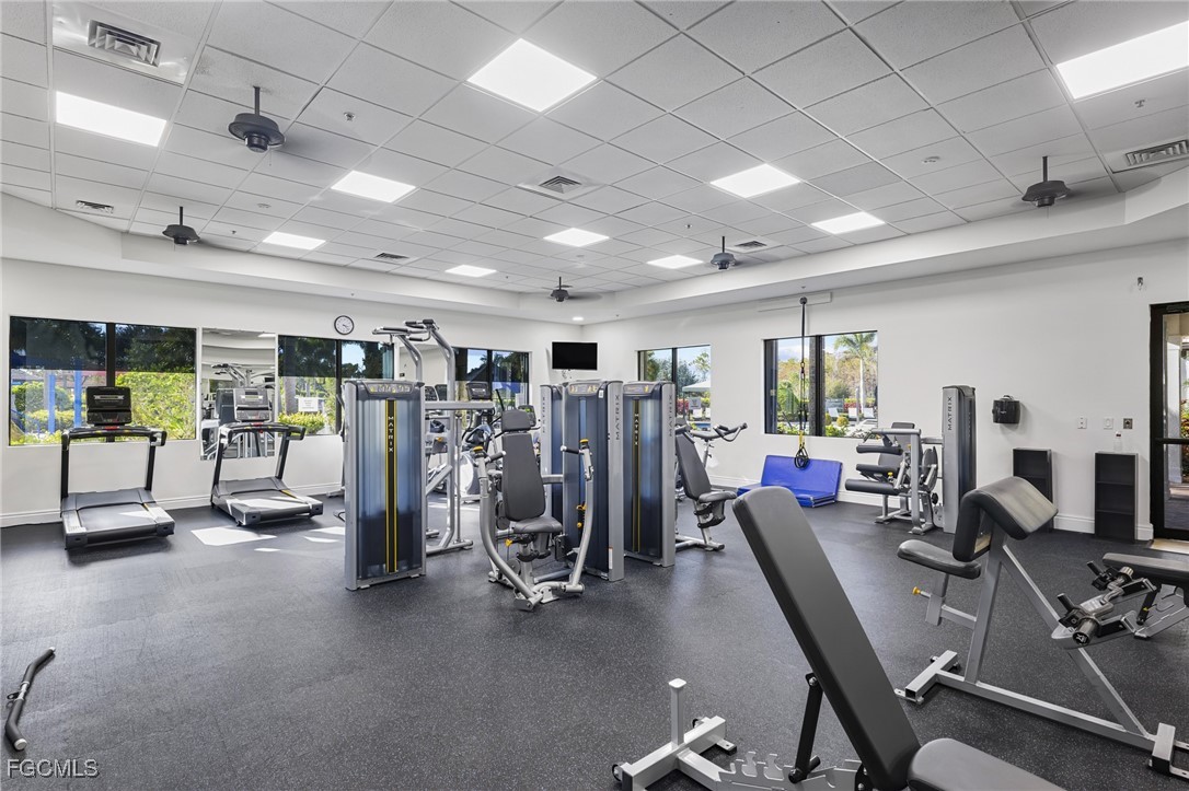 11040 Yellow Poplar Drive Fort Myers, FL 33913 - Photo 31 of 35 a view of a room with gym equipment