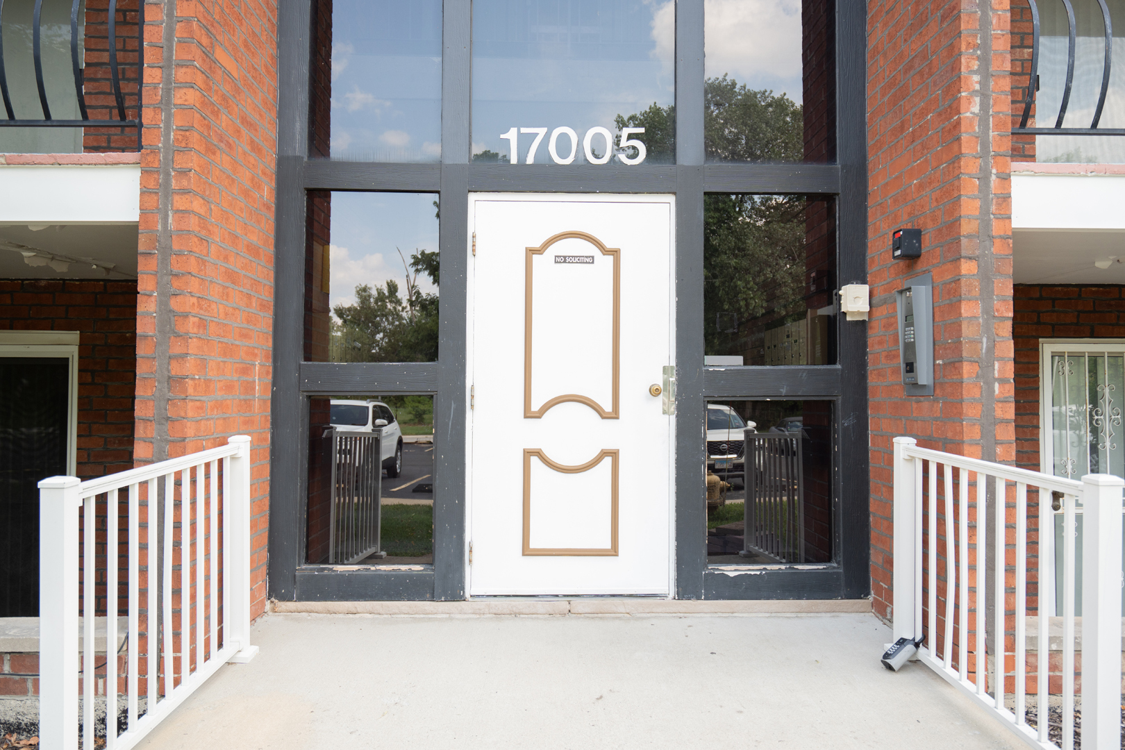 17005 Albany Avenue, Unit 202 Hazel Crest, IL 60429 - Photo 3 of 15 a sign that is on the side of a building