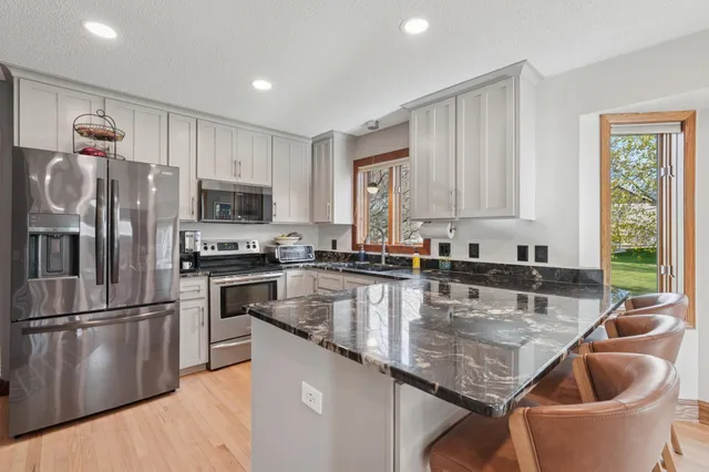 $565,000 | 6664 Clearwater Creek Drive, Hugo, MN 55038