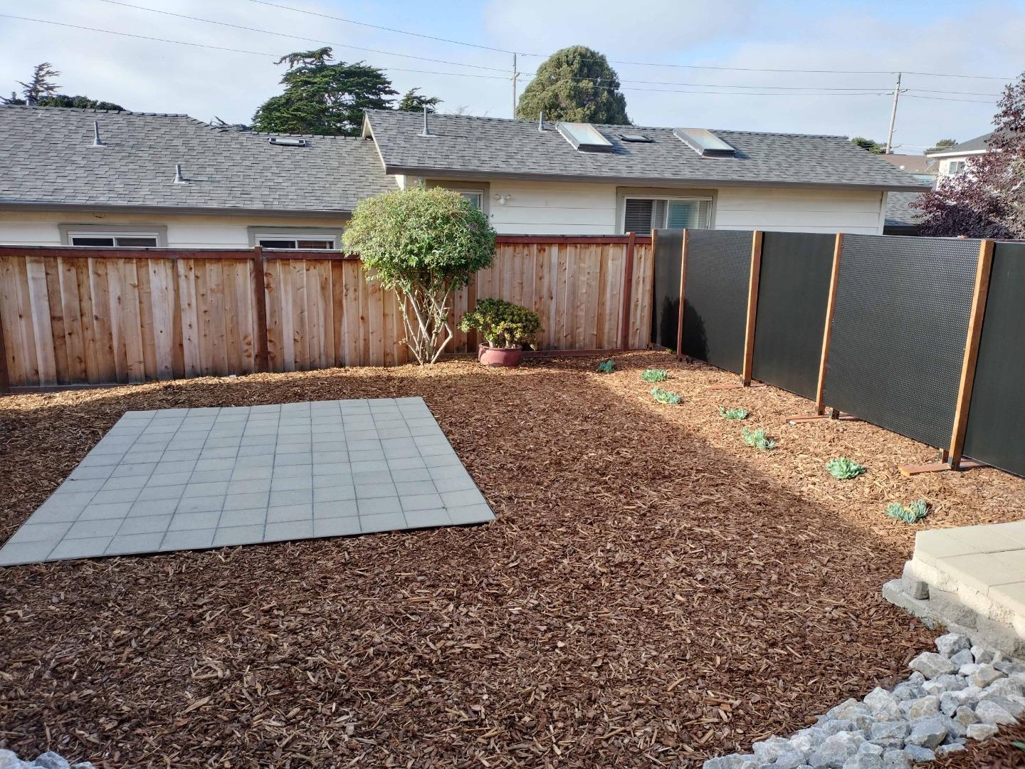 413-415 Dela Rosa Avenue Monterey, CA 93940 - Photo 11 of 22 a view of a backyard of a house