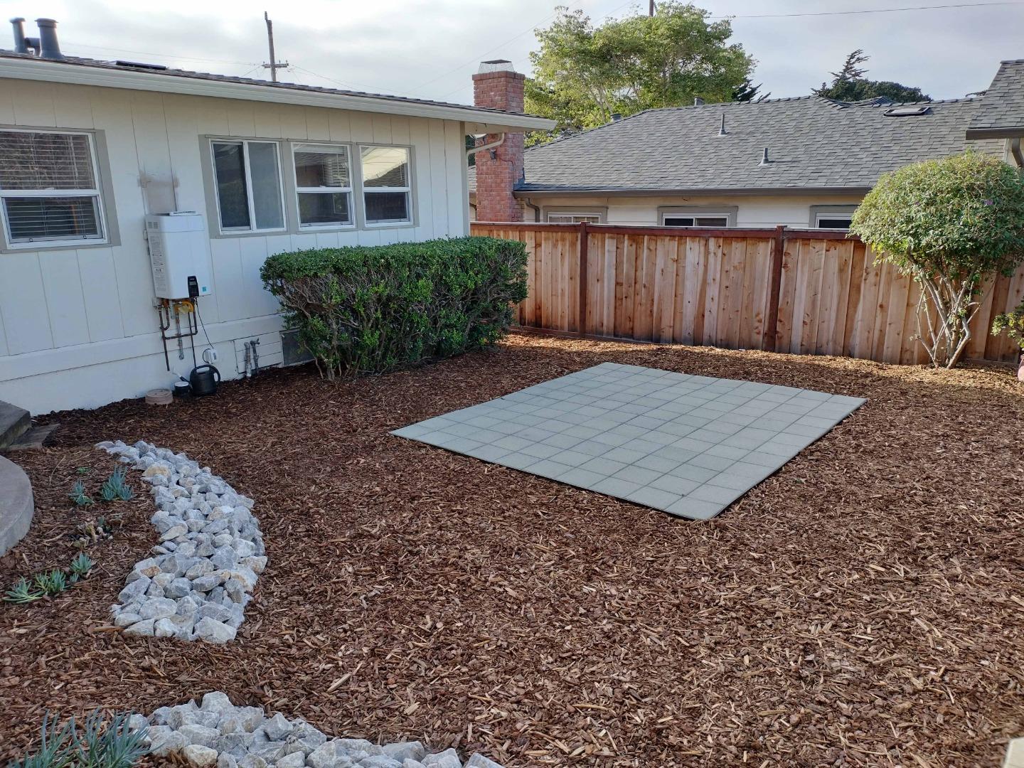 413-415 Dela Rosa Avenue Monterey, CA 93940 - Photo 12 of 22 a view of a house with a yard
