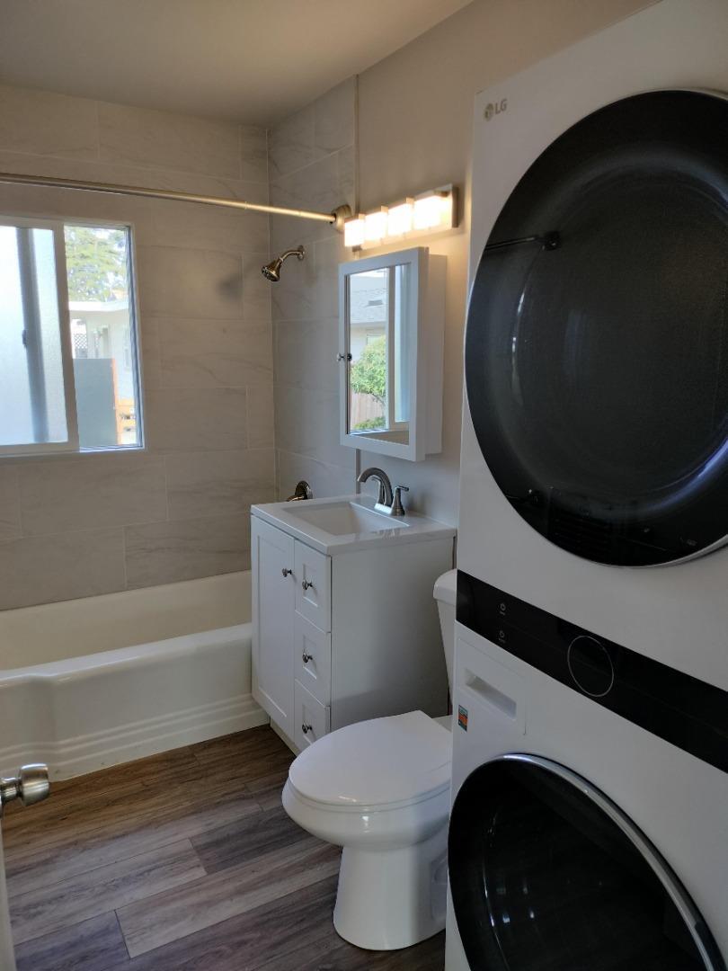 413-415 Dela Rosa Avenue Monterey, CA 93940 - Photo 7 of 22 a bathroom with a sink toilet and shower