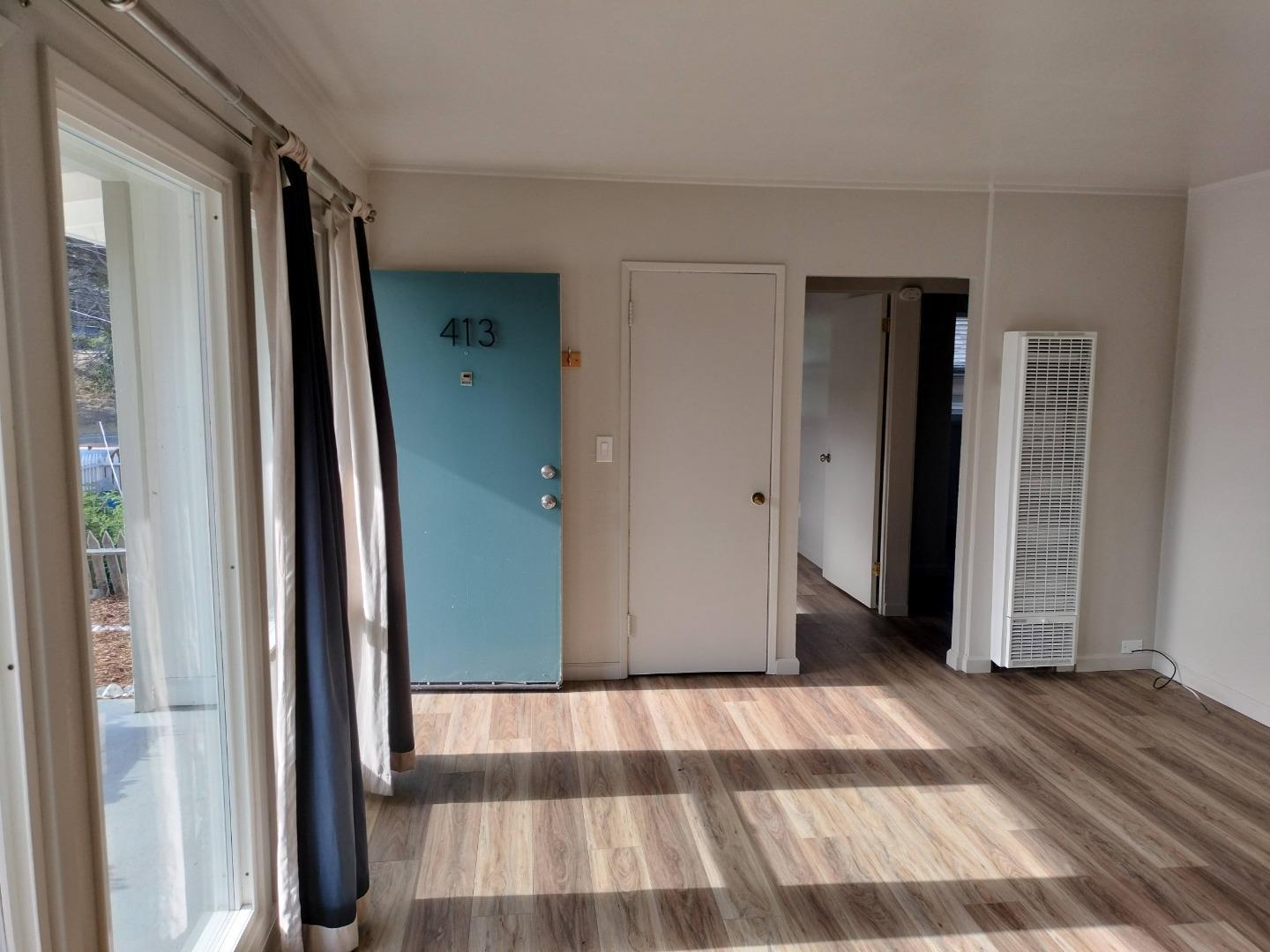 413-415 Dela Rosa Avenue Monterey, CA 93940 - Photo 8 of 22 a view of a room has a door and stairs