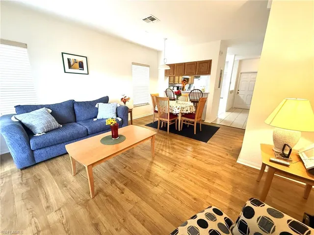 a living room with furniture and a couch