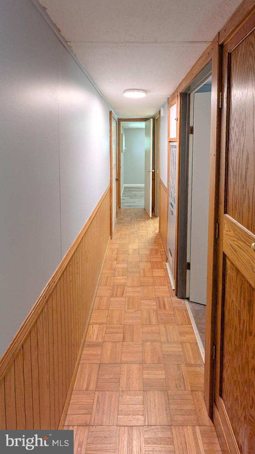 3806 Locust Grove Road Columbia, PA 17512 - Photo 17 of 27 a view of hallway with wooden floor