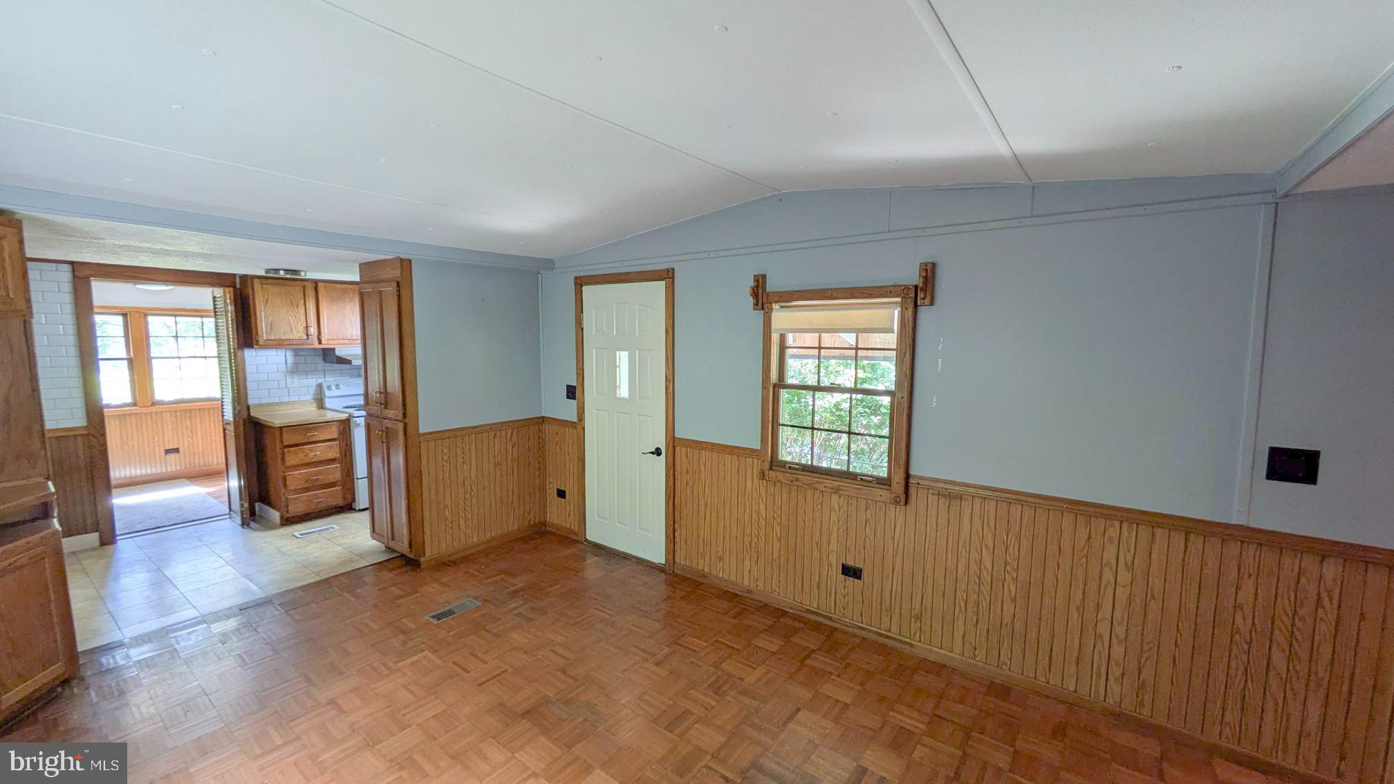 3806 Locust Grove Road Columbia, PA 17512 - Photo 7 of 27 a view of an empty room with window and cabinet