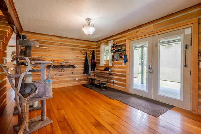 a view of a garage with a table and chairs