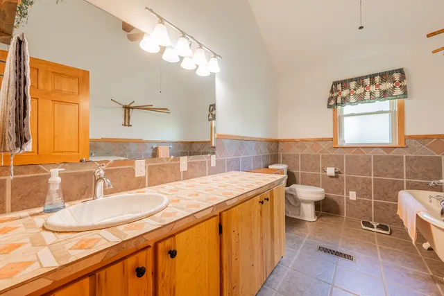 a room with gym equipment and a large window