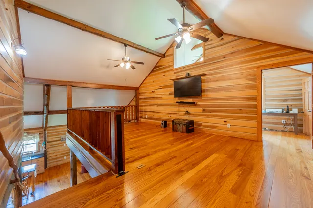a front view of a house with a yard and porch