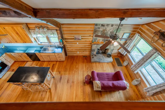 a house with a flower garden in front of it