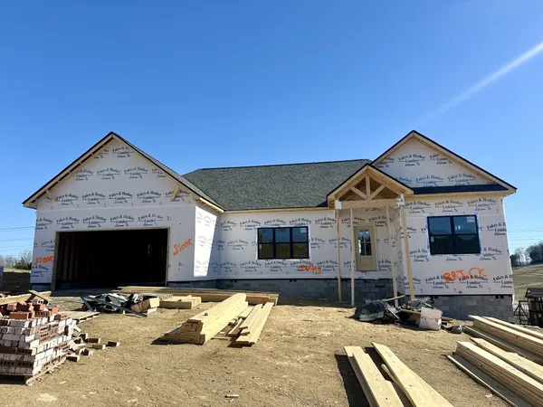 a view of a house with snow on the floor