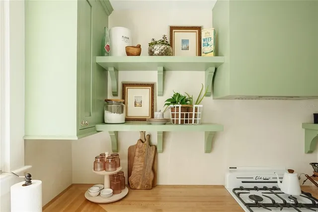 a bathroom with a window and a sink