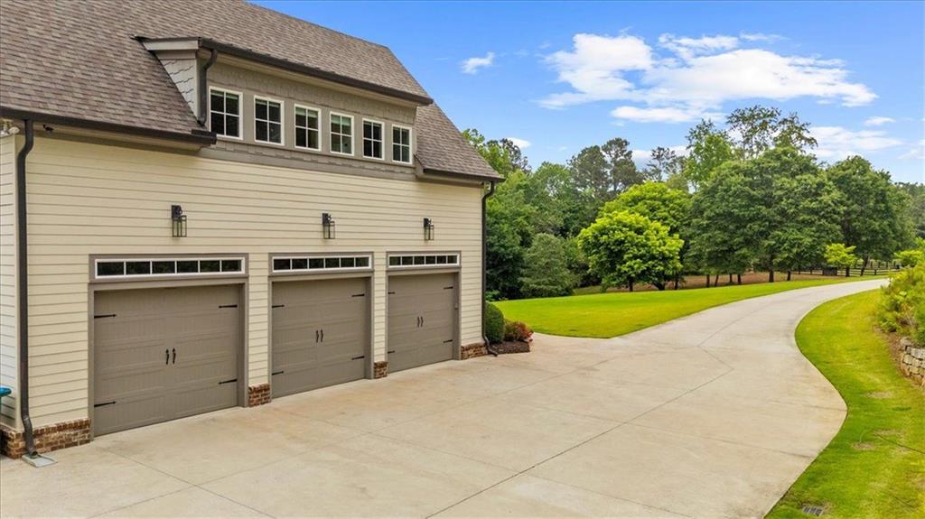 2503 Sugar Pike Road Canton, GA 30115 - Photo 41 of 134 a view of a house with swimming pool and a yard
