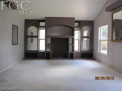 18627 Evergreen Road Fort Myers, FL 33967 - Photo 3 of 4 a view of empty room with windows