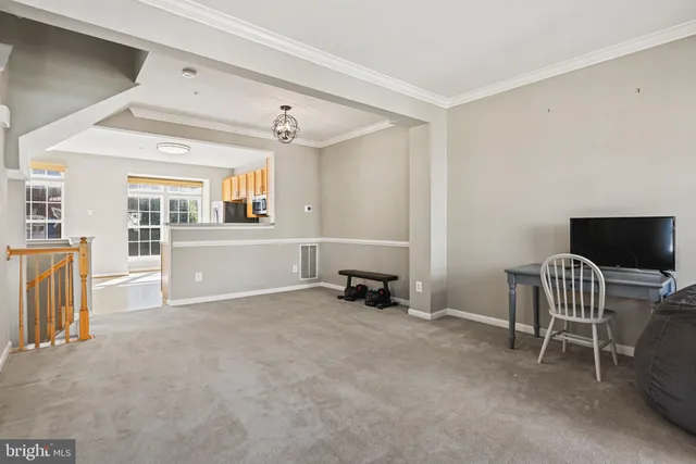 a view of livingroom with furniture and windows