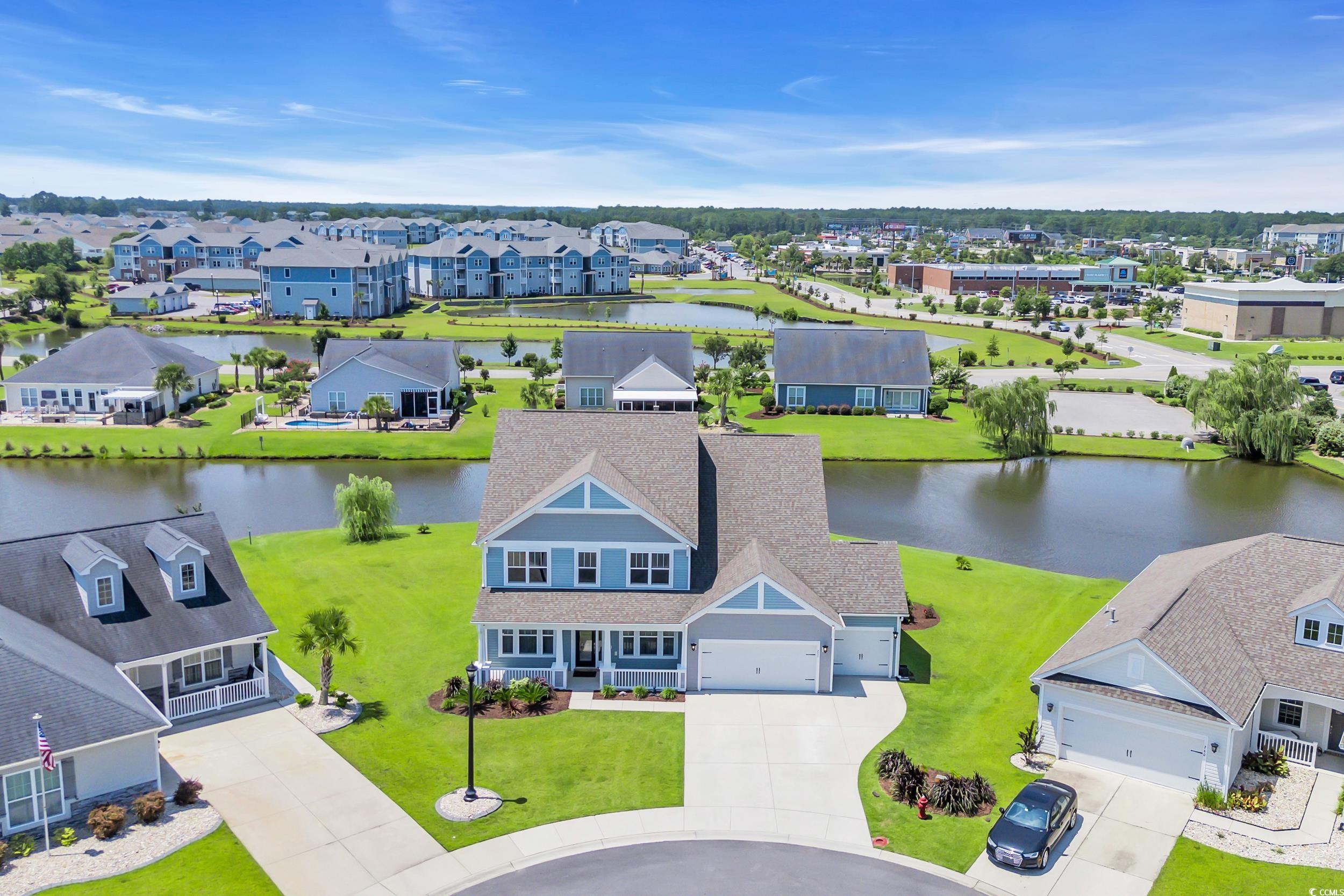 259 Hull Street Surfside Beach, SC 29575 - Photo 2 of 40 Aerial perspective of suburban area with a large body of water
