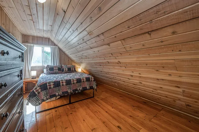 a view of a balcony with car parked