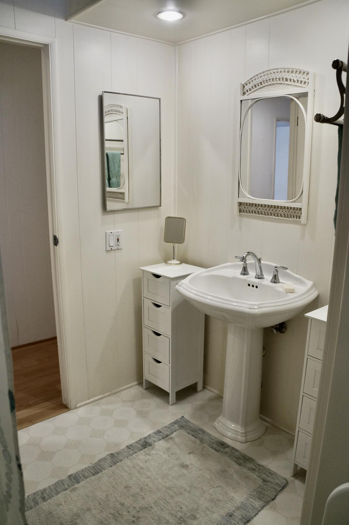 340 Old Mill Road, Unit 20 Santa Barbara, CA 93110 - Photo 14 of 15 a bathroom with a sink and a mirror