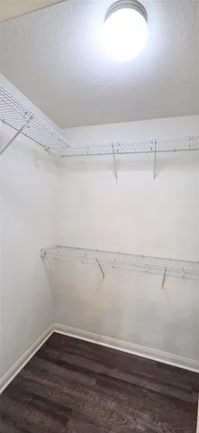 a view of a room with racks on the wall