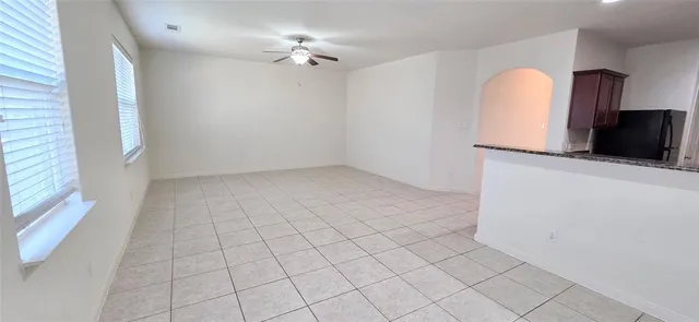 view of an empty room with a window