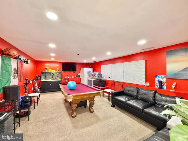 a outdoor living space with patio furniture and a potted plant