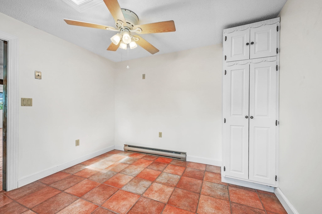 8 Barnes Street Wareham, MA 02571 - Photo 14 of 37 a view of a room with wooden floor and white walls