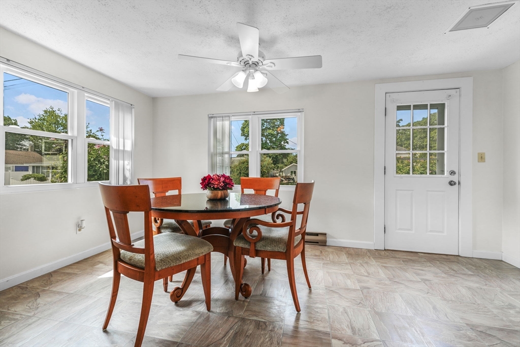 8 Barnes Street Wareham, MA 02571 - Photo 15 of 37 a view of a dining room with furniture window and outside view