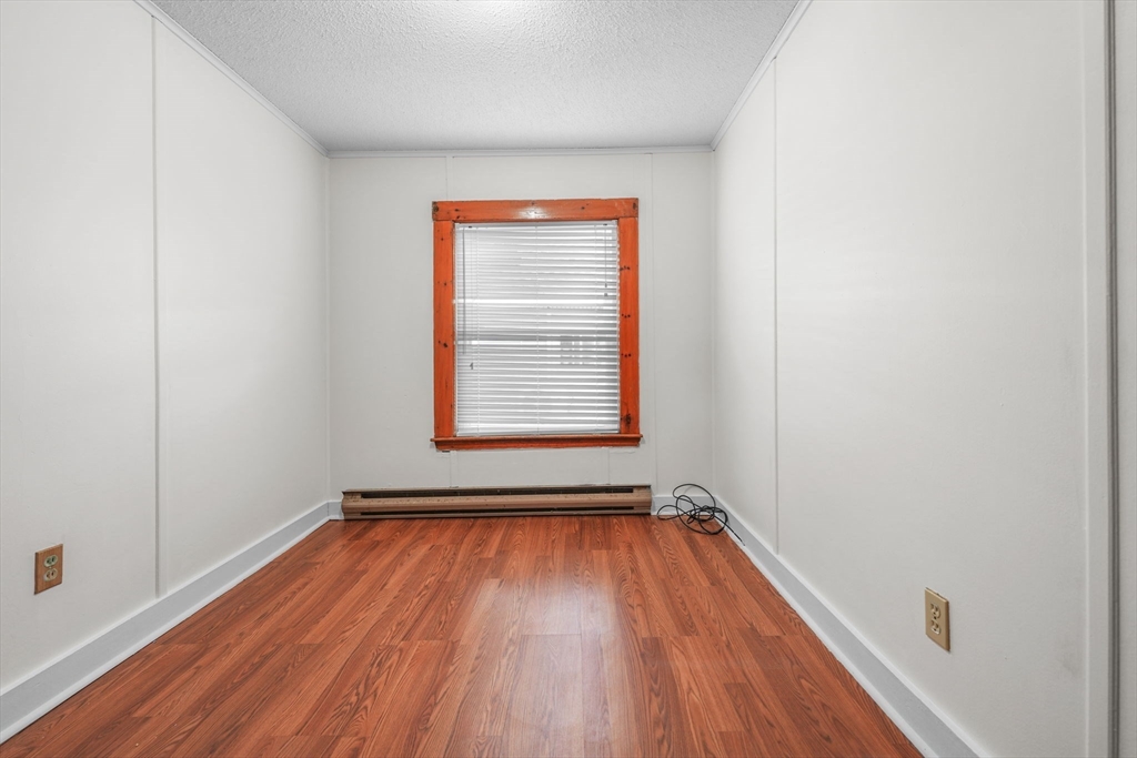 8 Barnes Street Wareham, MA 02571 - Photo 20 of 37 a view of a room with wooden floor and window