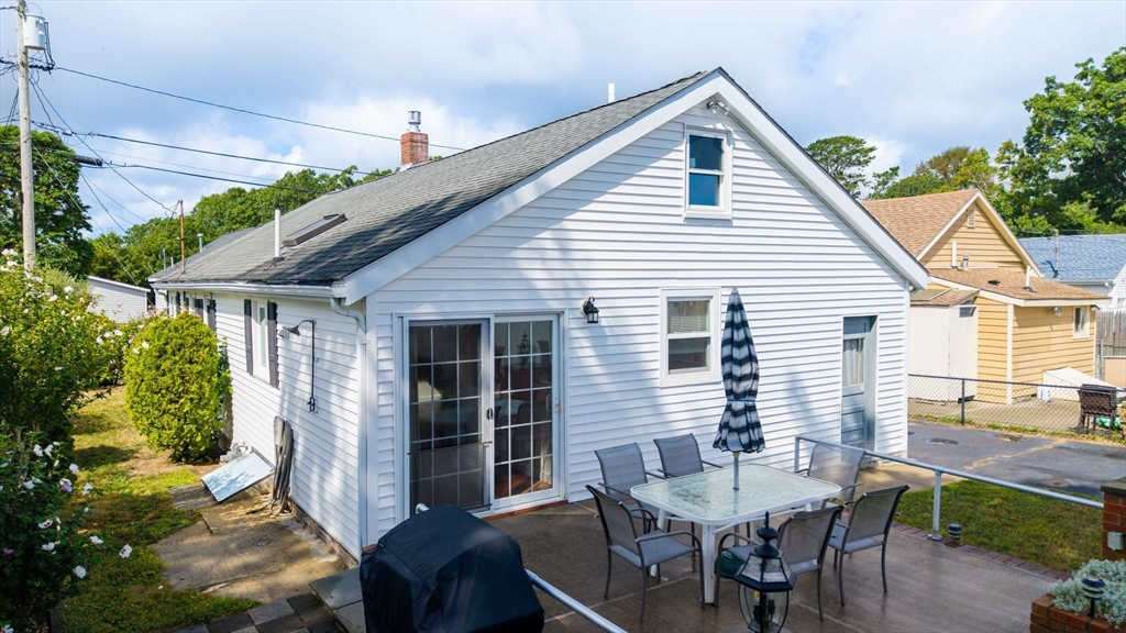 8 Barnes Street Wareham, MA 02571 - Photo 25 of 37 a view of a house with a patio