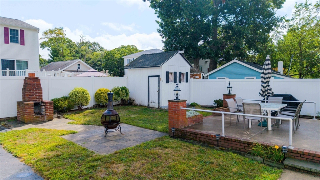 8 Barnes Street Wareham, MA 02571 - Photo 26 of 37 a view of a house with backyard and sitting area