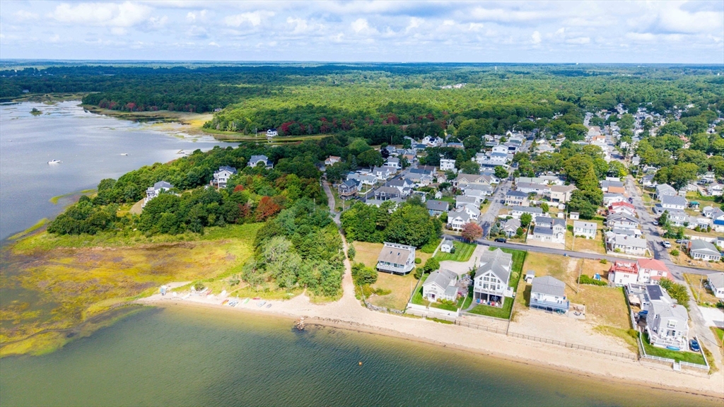 8 Barnes Street Wareham, MA 02571 - Photo 30 of 37 an aerial view of a houses with a yard and lake view