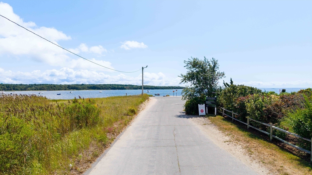 8 Barnes Street Wareham, MA 02571 - Photo 32 of 37 a swimming pool with wooden fence