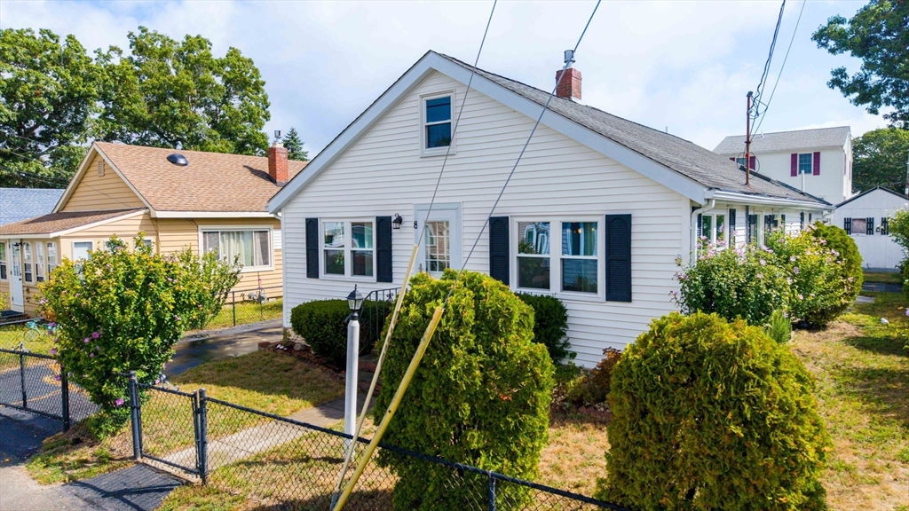 8 Barnes Street Wareham, MA 02571 - Photo 4 of 37 a view of house with a yard and potted plants
