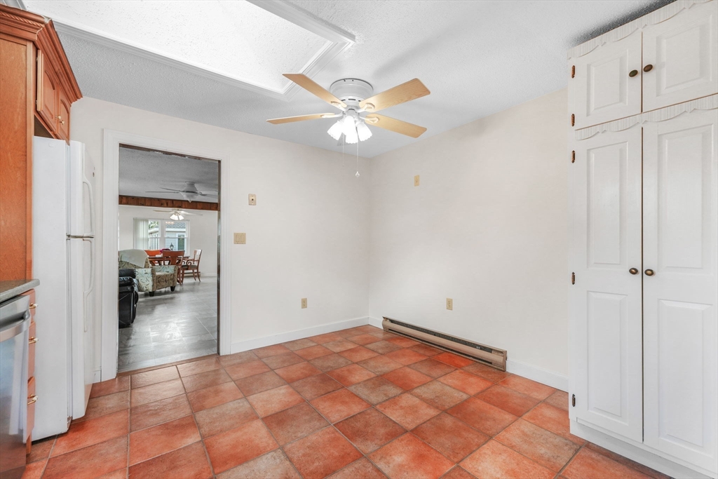 8 Barnes Street Wareham, MA 02571 - Photo 10 of 37 a view of a livingroom with a fireplace