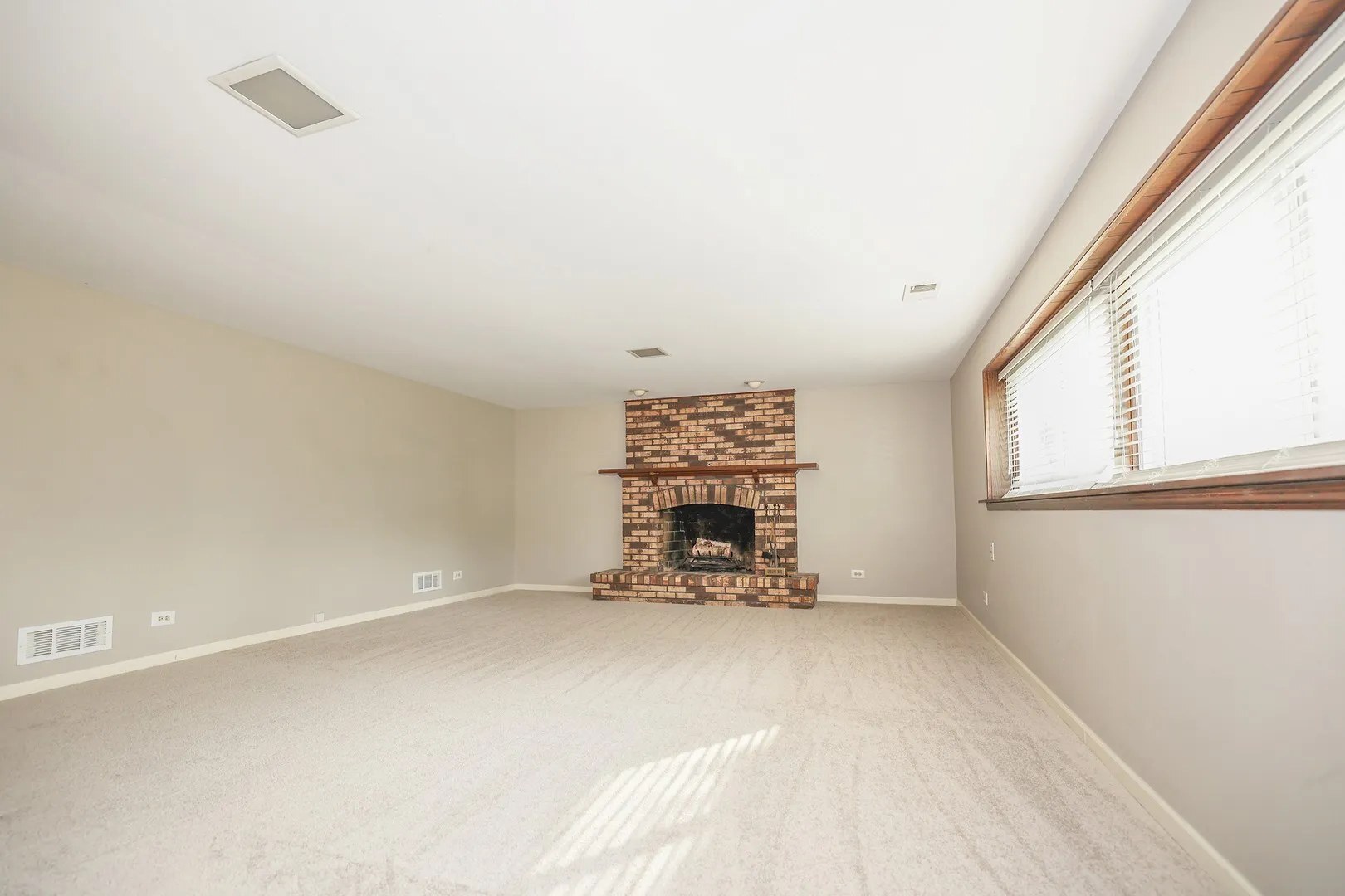 1329 Stonegate Road Naperville, IL 60540 - Photo 12 of 19 an empty room with windows