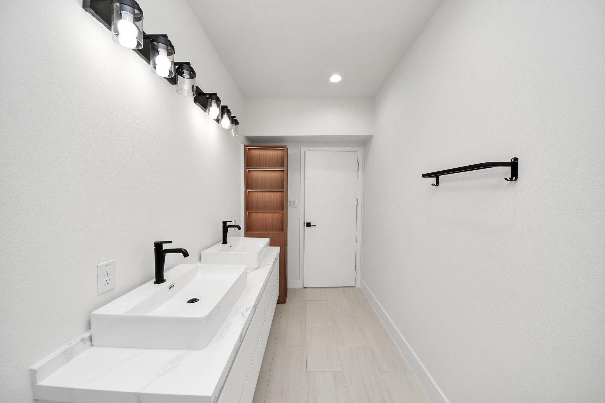 9014 Ferdinand Street Houston, TX 77051 - Photo 22 of 40 a bathroom with a sink and a mirror
