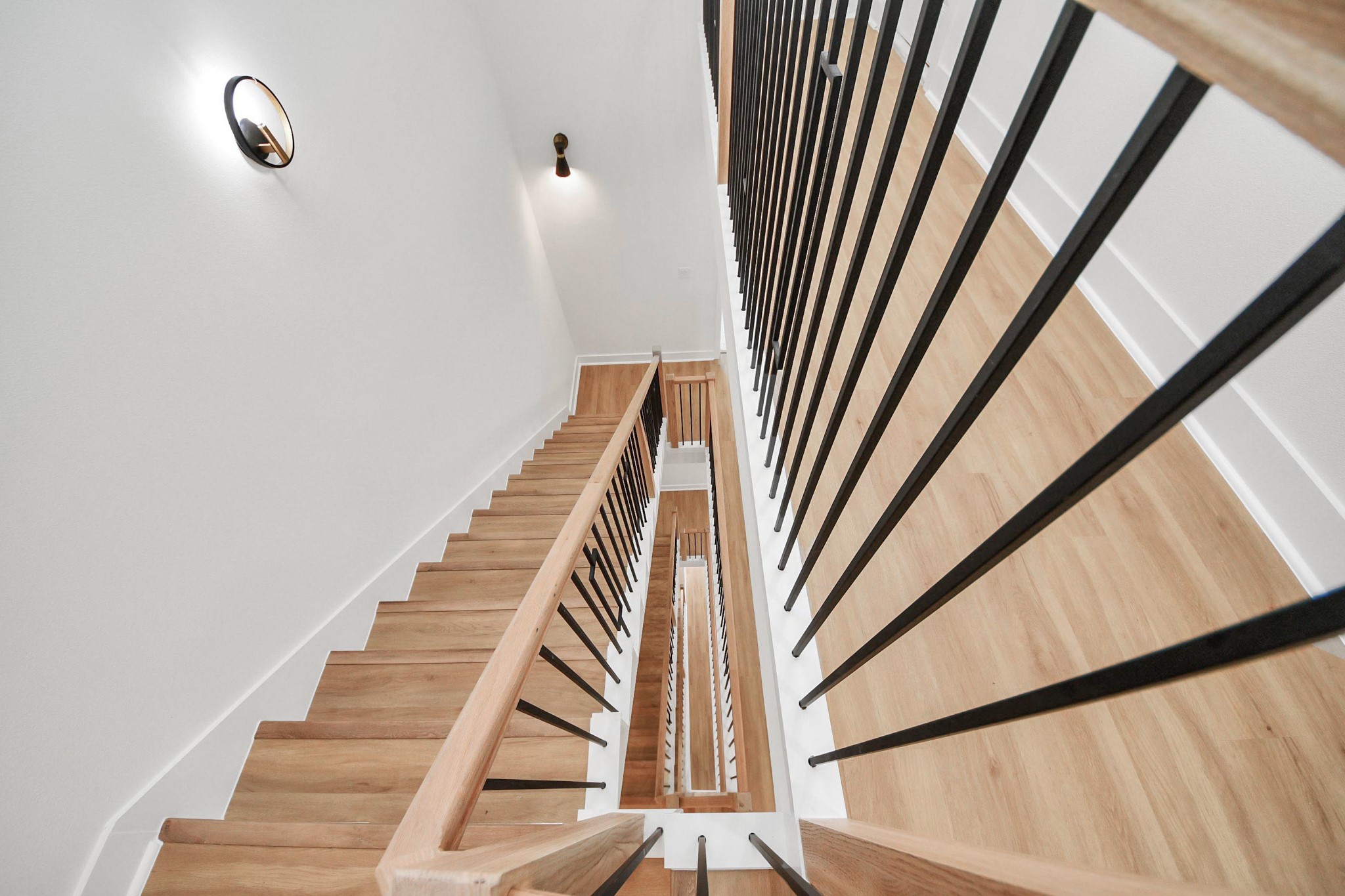 9014 Ferdinand Street Houston, TX 77051 - Photo 29 of 40 a view of staircase with white walls and a window