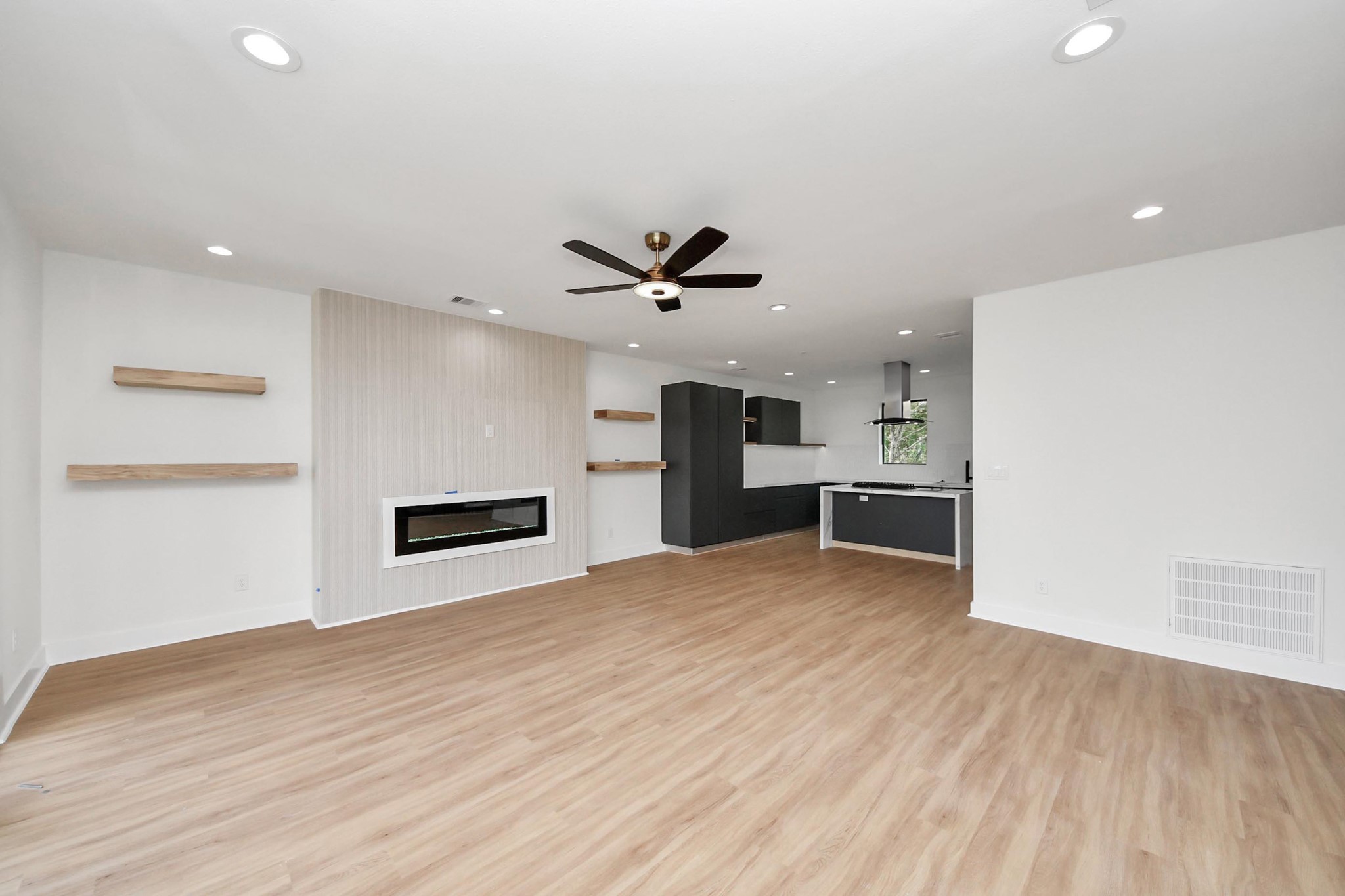 9014 Ferdinand Street Houston, TX 77051 - Photo 7 of 40 a view of kitchen with refrigerator and wooden floor