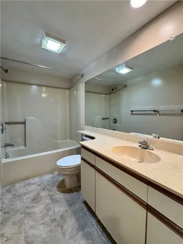 an aerial view of a house with a lake view