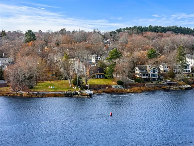 an aerial view of a town with houses