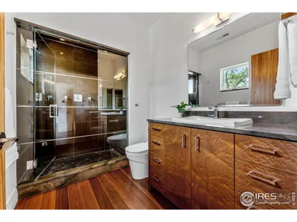 a bathroom with a sink a mirror and a bathtub