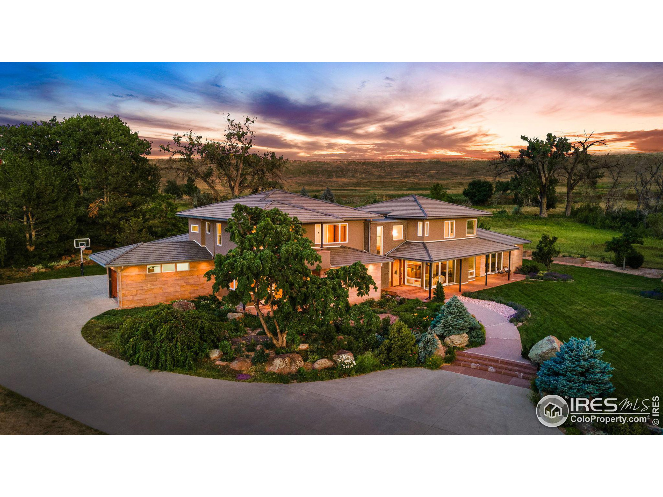 1000 Spring Drive Boulder, CO 80303 - Photo 36 of 40 a view of a swimming pool with a garden and trees
