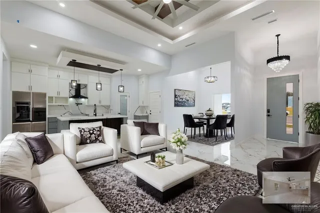 a living room with furniture and a table