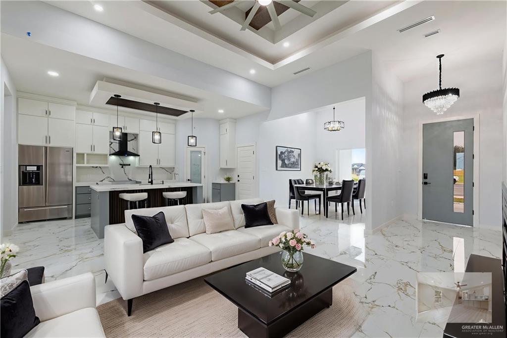 2630 Marky Street Harlingen, TX 78552 - Photo 31 of 42 a living room with furniture and kitchen view