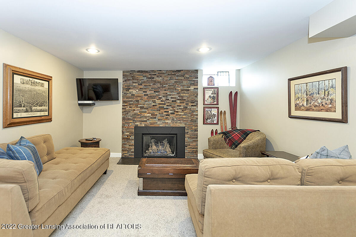 2807 South Cambridge Road Lansing, MI 48911 - Photo 23 of 28 Lower Level Family Room